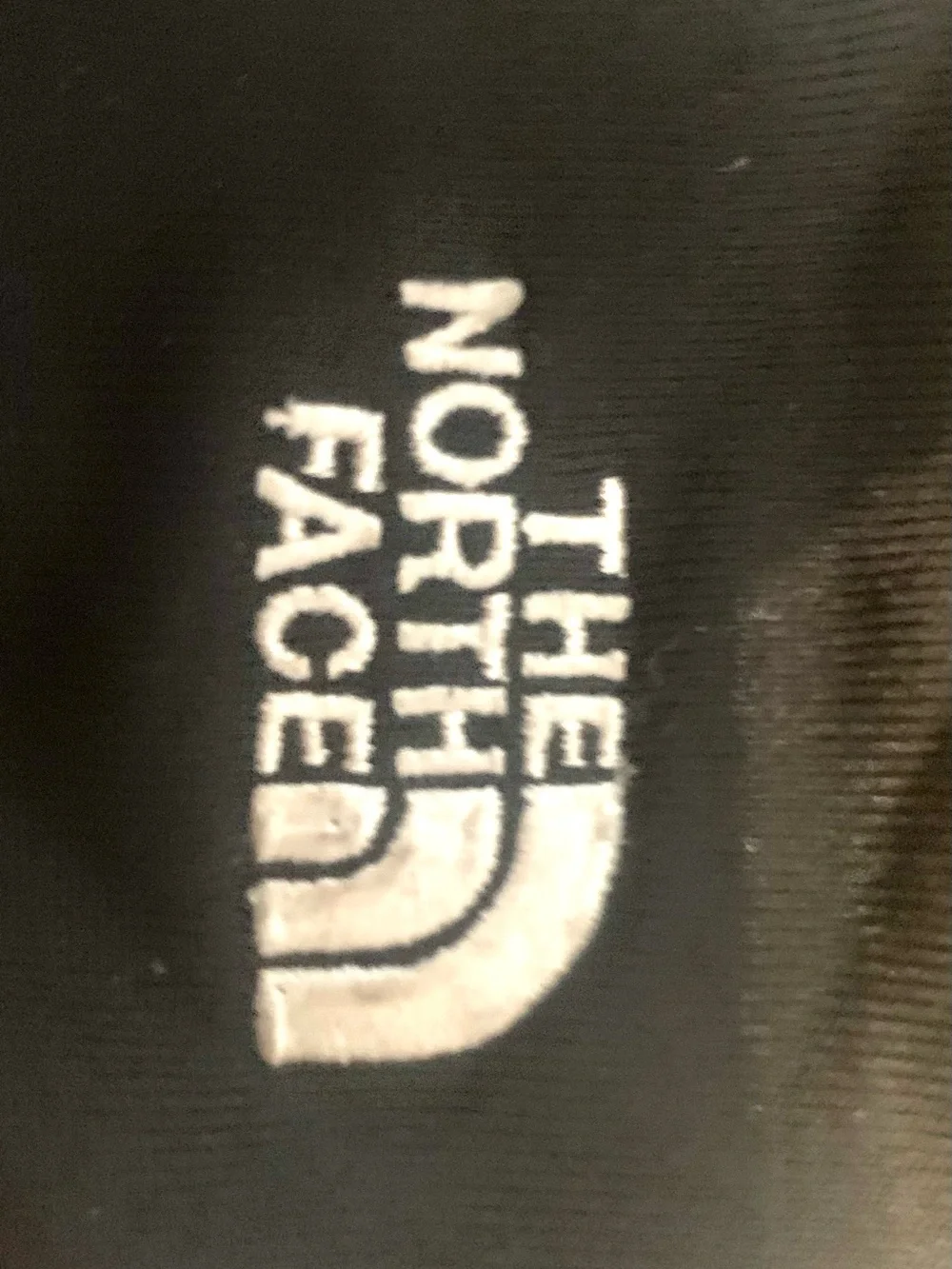 These north face gloves are mostly black, made with Polartec. Size XS
